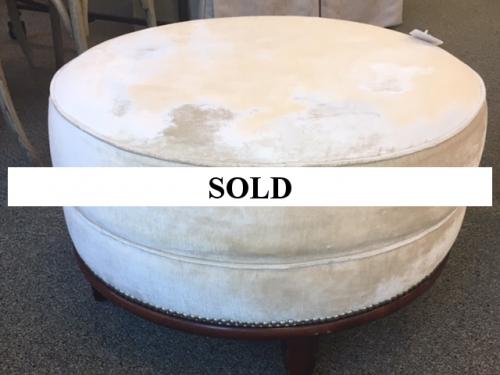 BEIGE ROUND OTTOMAN W/ NAILHEADS 26"DIAMETER X 16"H $295