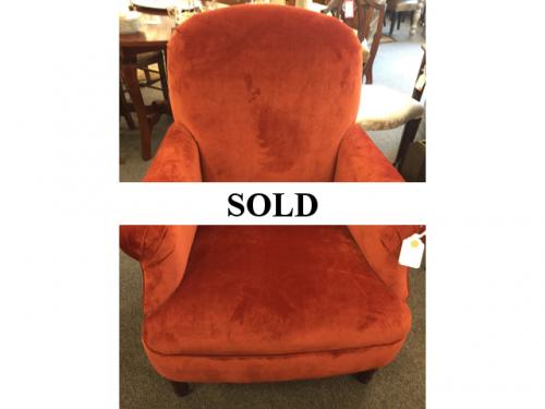 ORANGE UPHOLSTERED CHAIR $395