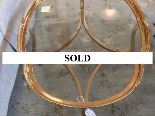 OVAL BRASS COFFEE TABLE WITH GLASS TOP 30"W X 45"L $495