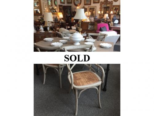 4 FRENCH HERITAGE WEATHERED CHAIRS W/ CANE SEATS $495  WEATHERED TABLE ON CASTORS 3' X 5.5' $795
